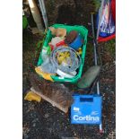 A plastic container of snow chains, wire, auto parts, etc.