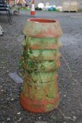 A terracotta chimney pot, 26'' high.