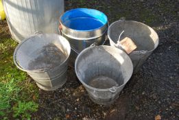 Three galvanised buckets and one other.