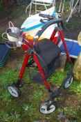 A NRS mobility folding push along Walker with basket.
