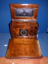 A Victorian walnut Correspondence Box, with slope, letter rack, leather calendar, drawer,