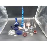 A small quantity of coloured glass including spiral shaped blue decanter, pink vase,