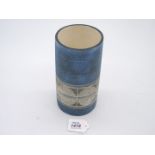 A Troika cylindrical Vase with light blue circular design on dark blue ground,