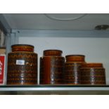 Four Hornsea storage jars, (one lid missing, one chipped).