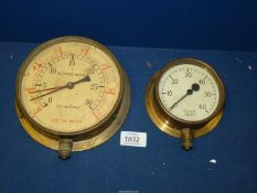 A brass cased Altitude gauge for water depth and a pressure gauge.