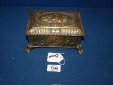 A Brass Box with details of Poseidon,
