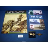 A South Wales Borders cuff links and tie pin set and two books 'WWI at Sea' (published 2007) and