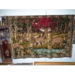 A large velvet wall tapestry of deer and stag by water, 6' x 47", plus a smaller wall tapestry.