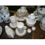 A small quantity of Carrigaline pottery teaware to include; teapot, milk jug, 4 bowls,