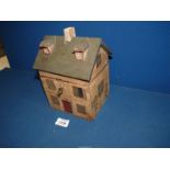 An interesting Tea Caddy in the form of a painted house, with key, 8'' high.
