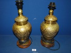 A pair of brass urn shaped Table Lamps.