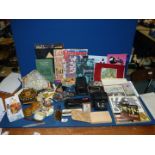 A quantity of miscellanea including cameras, wind up toys, autograph book, onyx ornaments, shells,