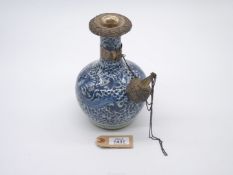A Chinese porcelain export kendi, probably early Qing, painted in blue with a phoenix design,
