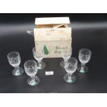 Six Stuart Crystal sherry glasses.