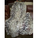 A pair of beige and brown leaf design lined Curtains, (some marks to lining),