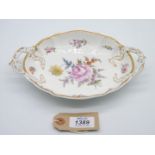 A fine Nymphenburg two handled dessert Dish of rococo style hand painted with flowers,