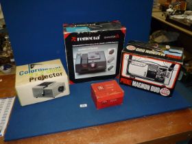 A Reflecta Diamator 35mm Slide Projector, a Boots Colormaster 2x2 Slide Projector,