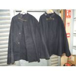 Two woollen Police Capes with lion mask fastenings and three buttons below,
