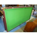 A contemporary 2/3 size Snooker/Billiards Table, green baize top and standing on square legs,