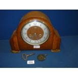 A Smiths Enfield wooden Mantle Clock with key and pendulum, 12 1/2'' wide x 9'' high.