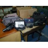 Four Video Cameras - A Hitachi DZ-MV3000E mini DVD and SD Card Digital Video Camera with Hitachi