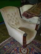 An elegant circa 1900 buttoned back deep-seated low Armchair,