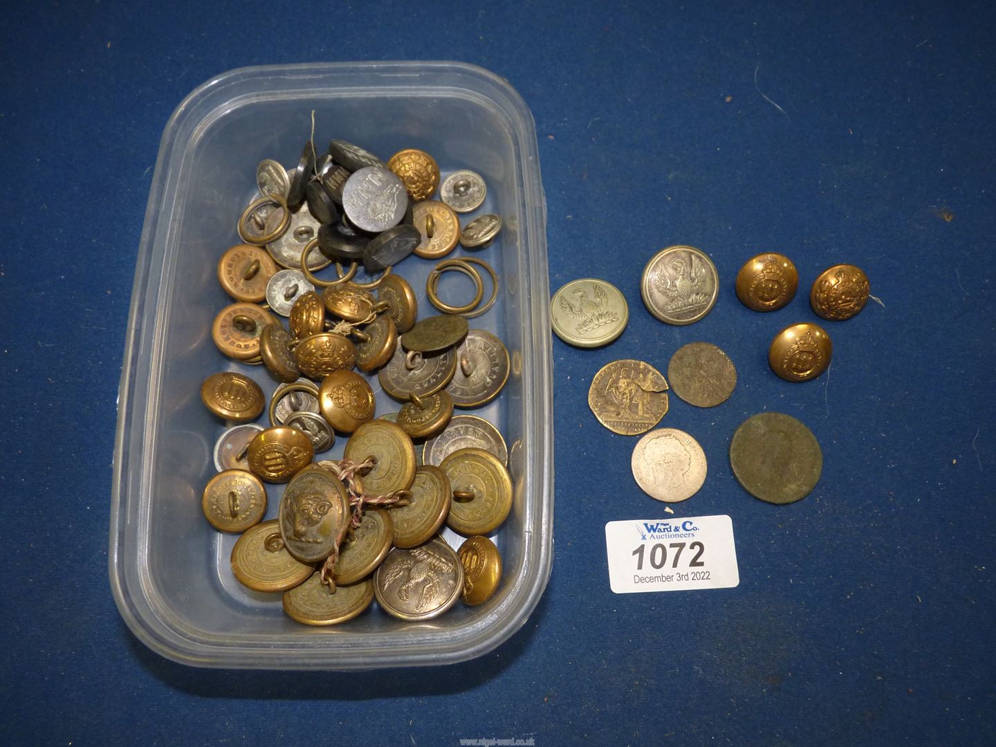 A quantity of brass and white metal army buttons, old coins etc.