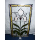 A leaded glass panel with Iris design 265 x 465 mm.