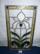 A leaded glass panel with Iris design 265 x 465 mm.