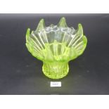 An Uranium glass vase having flower holder insert.