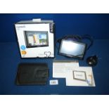 A Garmin Nuvi52 LM Satnav in box with car lead and stand.