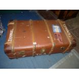 A bentwood bound Steamer Trunk with some travel labels, 35'' x 20'' x 12''.