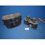 A pair of WWI/II Karl Zeiss Binoculars in leather case.