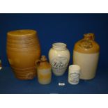 A quantity of salt glaze jars and flagons including Morgan & Evans, Abergavenny,