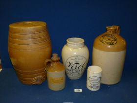 A quantity of salt glaze jars and flagons including Morgan & Evans, Abergavenny,