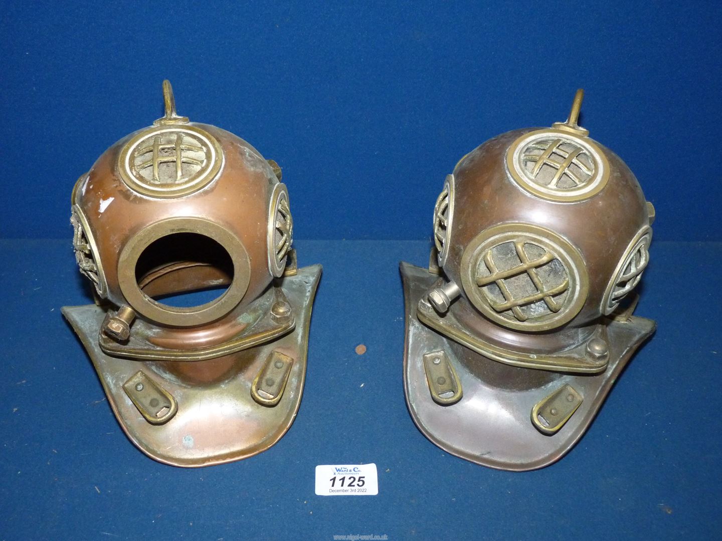 A pair of small nautical Copper and brass Diving Helmets, 7'' wide x 7 1/2'' approx.