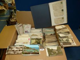 A large quantity of Postcards some dated 1920's/30's, plus an album containing postcards,