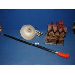 An Industrial workshop light, red Dragon head cane and a matchstick model of The Old House,