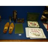 Two sets of Portmeirion placemats, small bottles, thermometer, small scales, flower book,