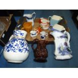 A quantity of jugs including Wade Scotch Whisky, brown with greyhound handle,