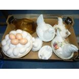 A pottery Egg basket with 'Egg' lid, plus Hen in baskets; Regal china with fruit decoration,