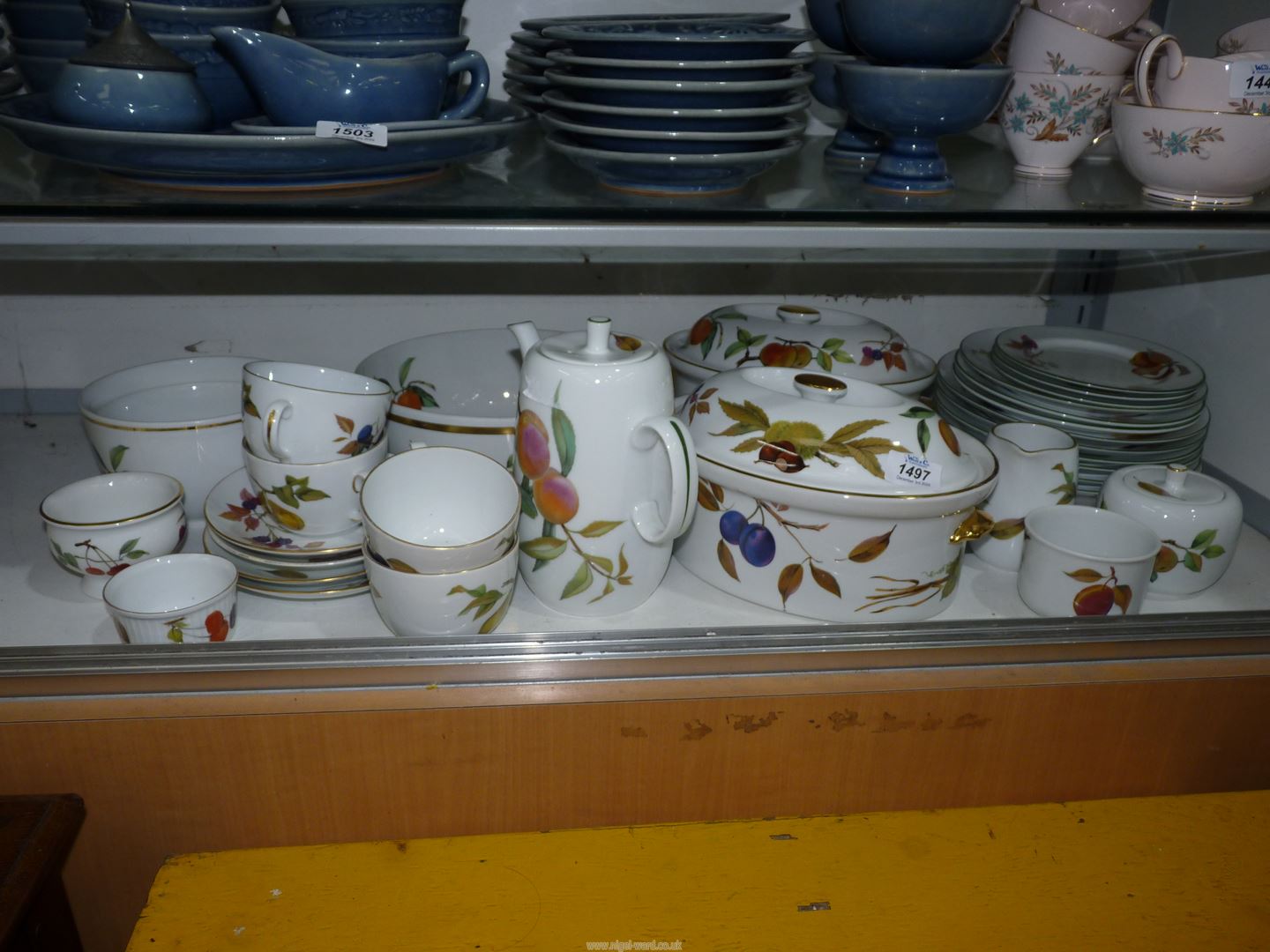 A quantity of Royal Worcester 'Evesham' and 'Evesham Vale' tableware including two large lidded