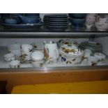 A quantity of Royal Worcester 'Evesham' and 'Evesham Vale' tableware including two large lidded