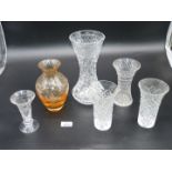 A tall cut glass vase and pair of matching vases, also a brown glass vase.