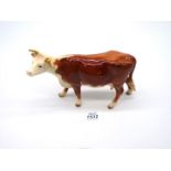An early Beswick Hereford Cow, issued 1941, (some crazing and leg been re-glued),