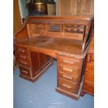 A good Oak scroll form double pedestal roll-top Desk,