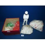 A tin of Beta Builder bricks in white, red and green and a Stig figure, 11'' tall.