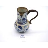 A transisitional period of Kangxi porcelain Jug painted in blue, red and gold,