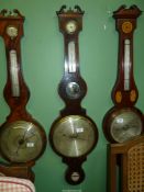 A Mahogany banjo style mercury Barometer by Silvester, Bromwich, 42 3/4'' tall overall.