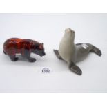 A Canadian flambe Grizzly Bear and a USSR Seal